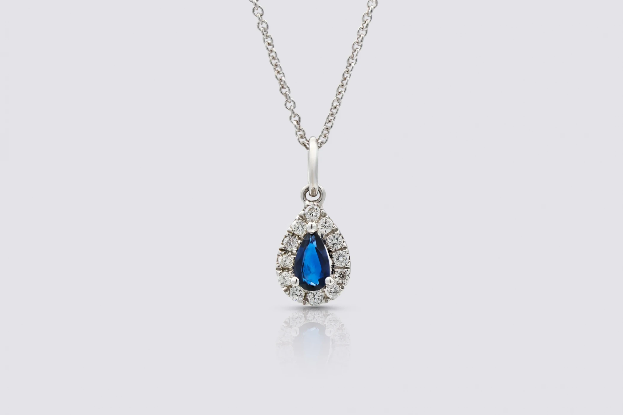 18ct White Gold Pear Sapphire and Brilliant Cut Diamond Pendant Necklace